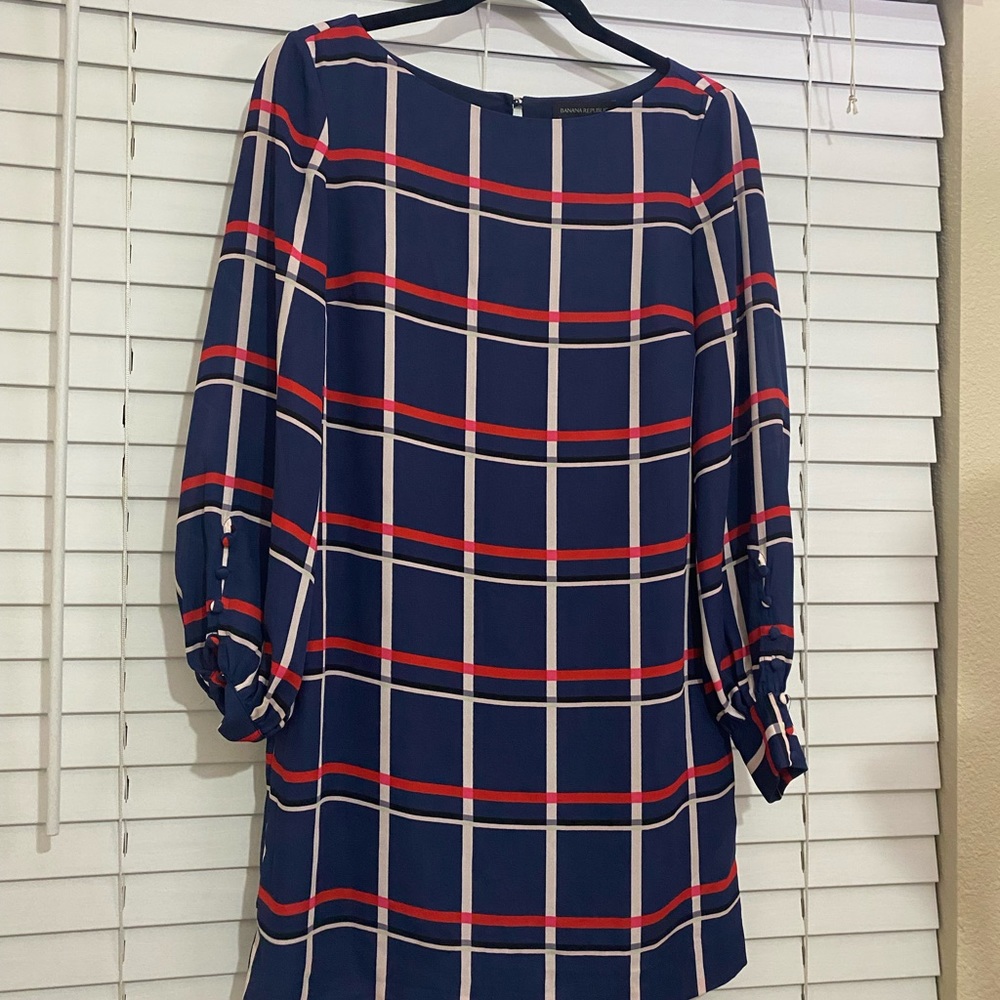 Above knee length dress.